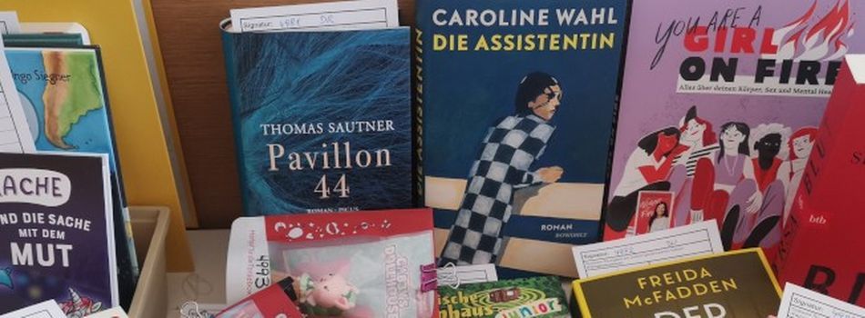 <div class=slidertitel>Viele neue Bücher</div><div class=slidertext>neu..... und viele mehr</div>